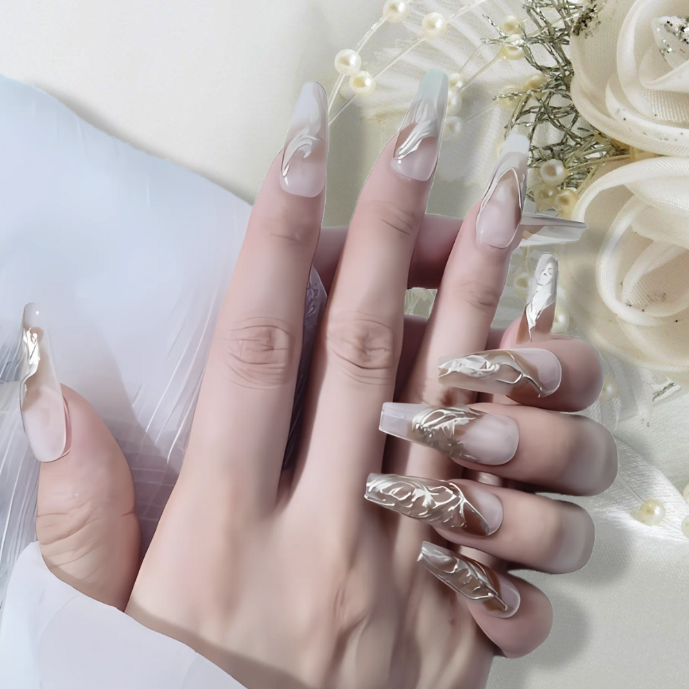 Gold metallic coffin press on nails for weddings with marble accents in neutral tones, featuring intricate details and a luxurious finish.