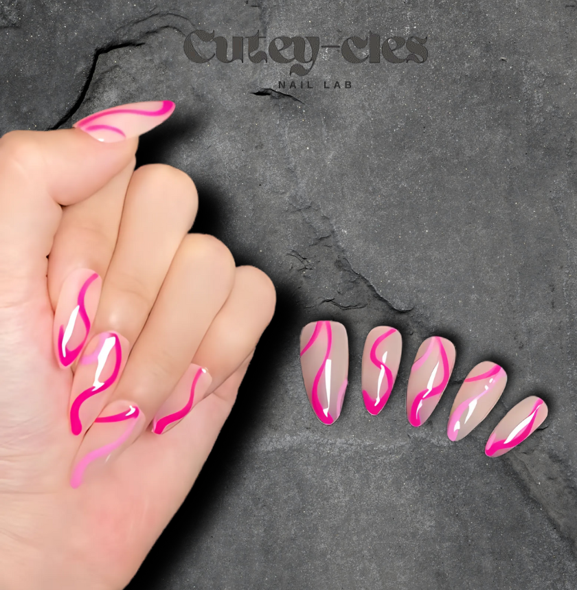 pink swirl press-on nails featuring a nude base with bold pink wavy designs, displayed on a hand with a modern and chic aesthetic.