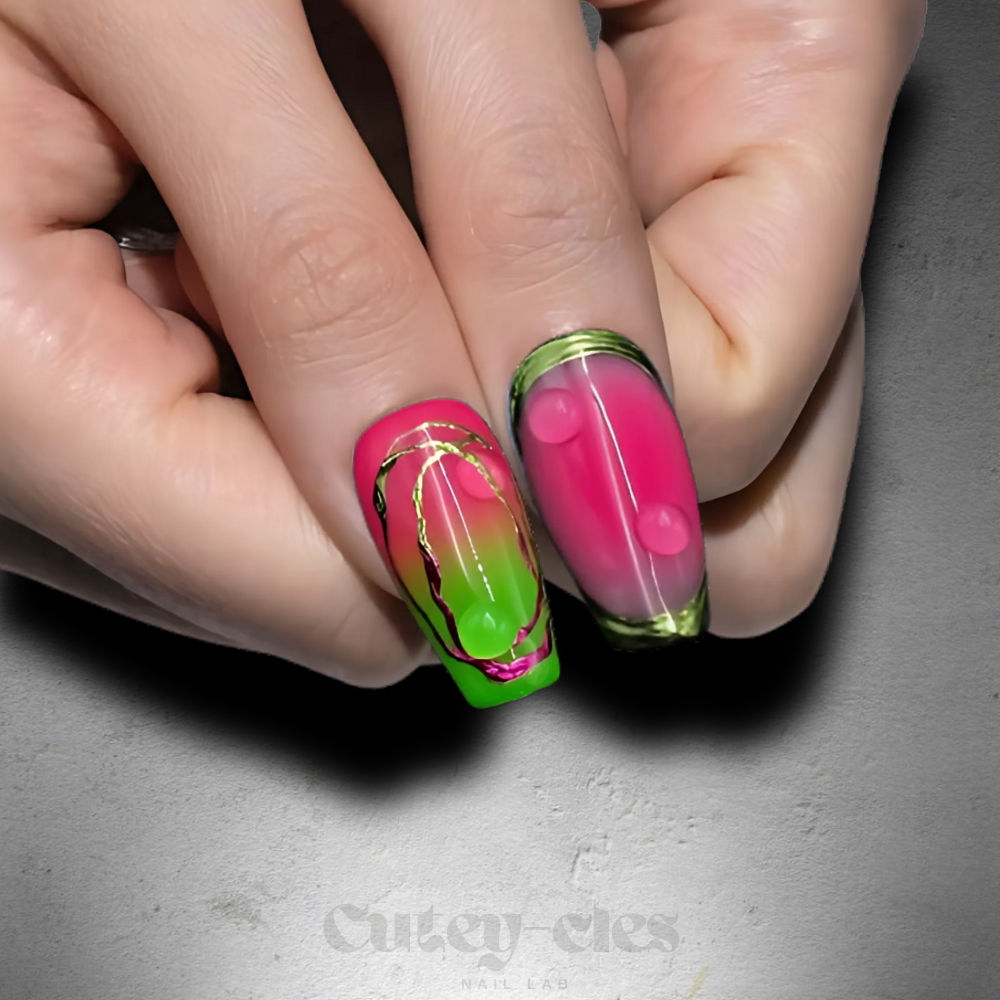 Medium coffin press-on nail set showcasing neon gradient designs with pink, green, and gold elements.