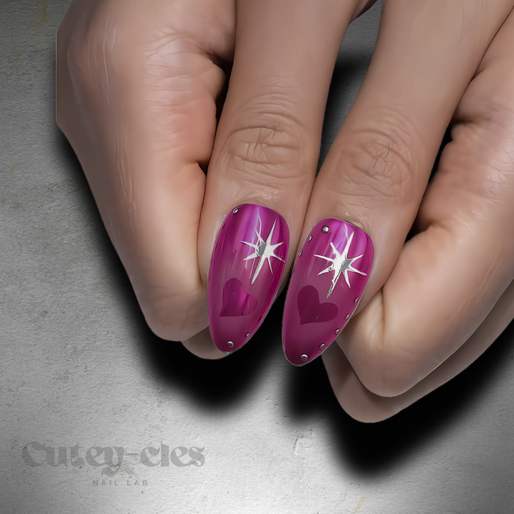 romantic magenta press-on nails featuring glossy finishes, heart designs, and shimmering stars.