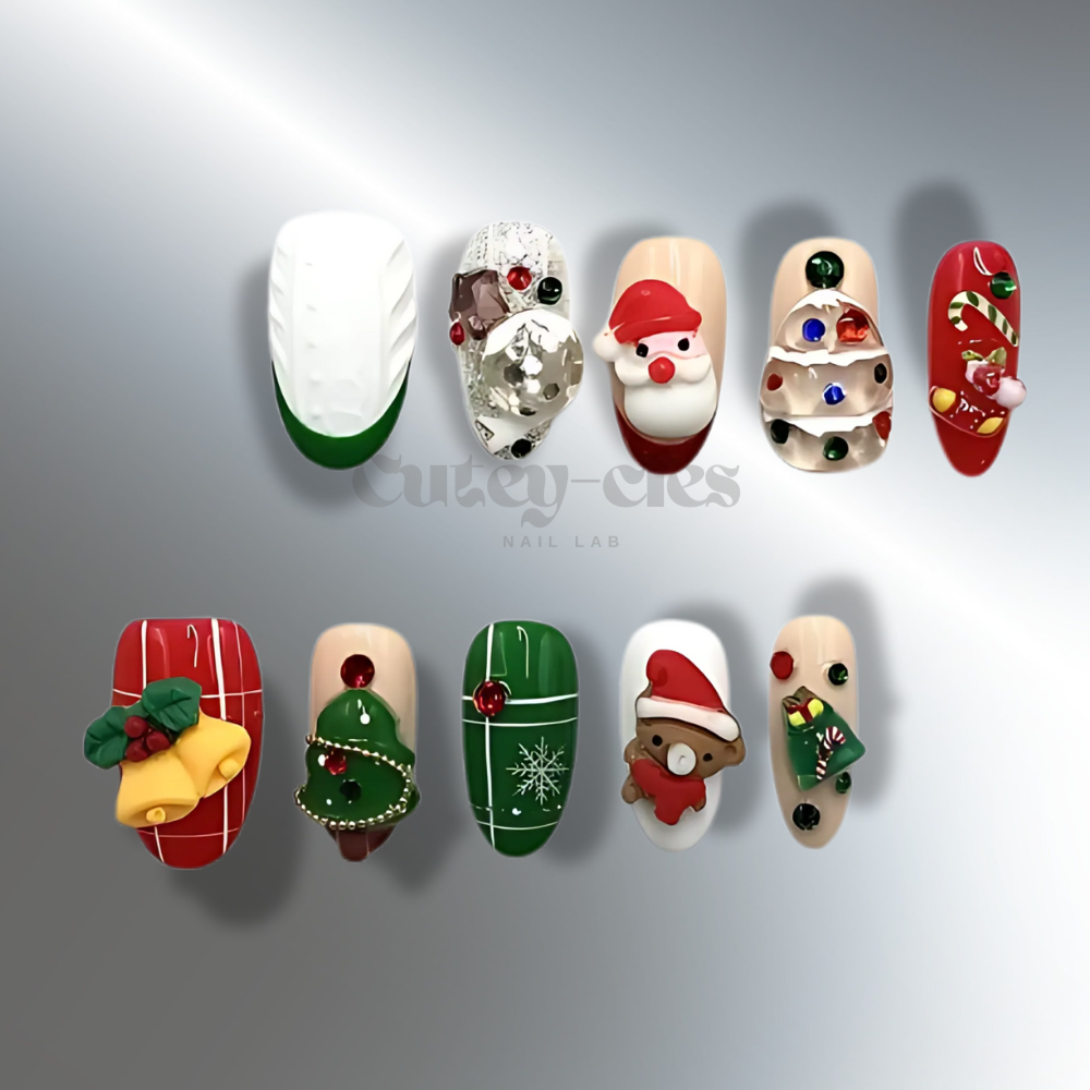 Christmas-themed 3D press-on nails with designs including Santa Claus, Christmas trees, ornaments, bells, and candy canes in festive red, green, and white tones.