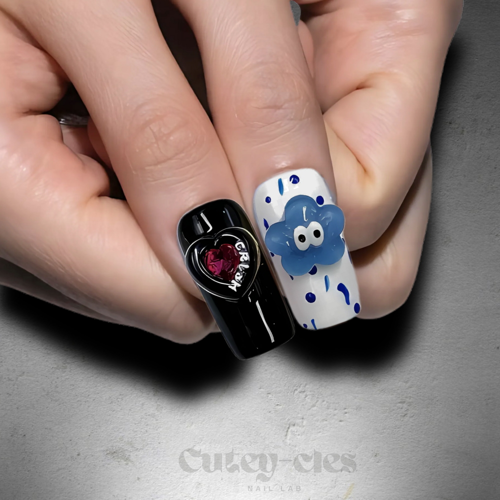 Medium square press-on nail set with bold designs, including kawaii-style charms and colorful patterns.