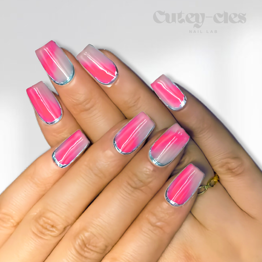 square-shaped pink ombre press-on nails with chrome cuticle outline, glossy finish, and a modern gradient design.