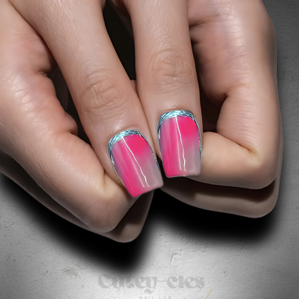 square-shaped pink ombre press-on nails with chrome cuticle outline, glossy finish, and a modern gradient design.