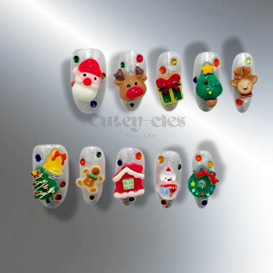 3D jelly Christmas press-on nail set featuring Santa Claus, reindeer, wreaths, snowmen, and colorful holiday-themed accents on a snowy white base.